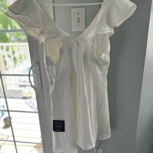 Lulu’s white dress size large with tags. Never worn!